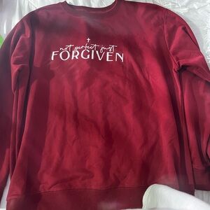 Red Sweatshirt with 'FORGIVEN' Print